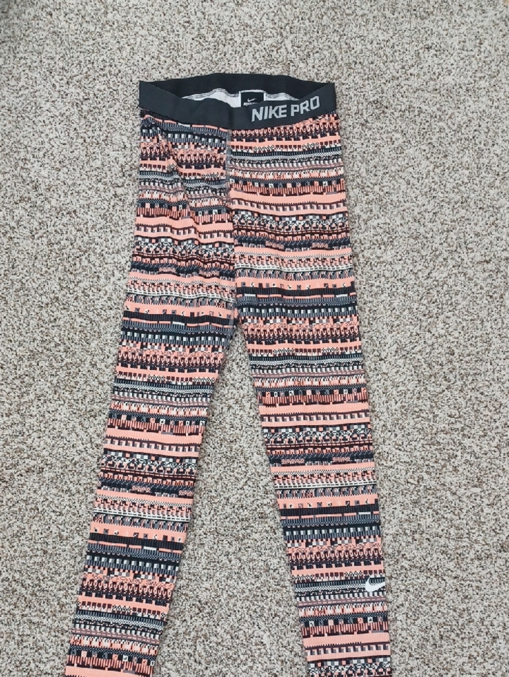 Women's Nike Cantelope Orange and Black Patterned Leggings Size Small